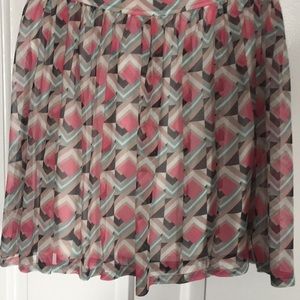 Pattered pleated mini skirt